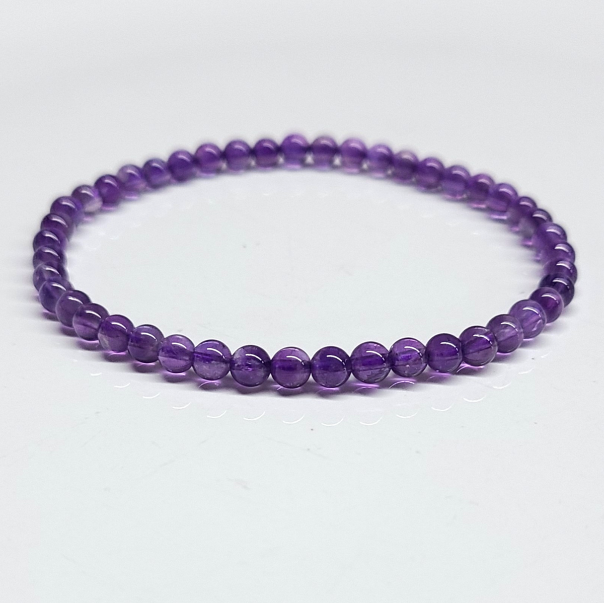 Amethyst Round Bead Bracelet - The Serenity Stone